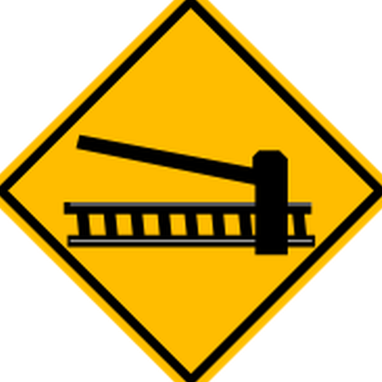 Señal de tránsito: Cruce ferroviario con barrera